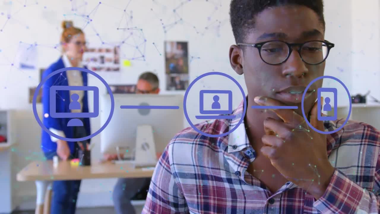 Animation of set of three digital icons over business people