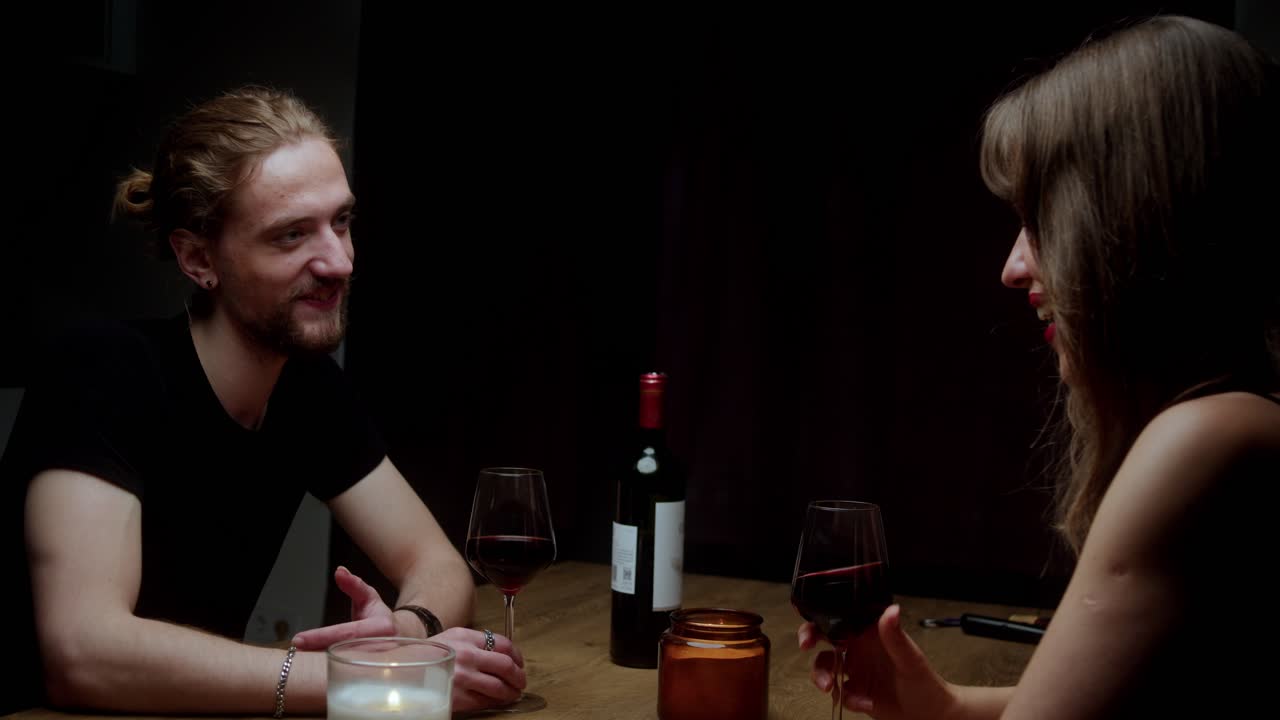 Romantic Couple Enjoying a Dinner Date with Wine