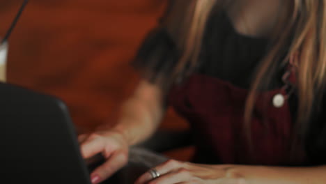 close up of woman hands using mobile phone and laptop computer with blank copy space screen for your advertising text message or content business in the vintage effect
