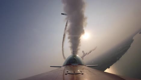 rare - unique air to air footage of a stunt plane carrying out aerobatics - public airshow at the riverfront