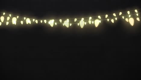 animation of illuminated lights hanging on black background