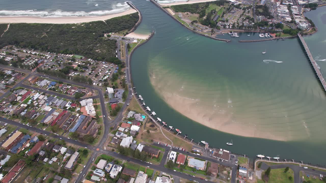 Calm Waters Of Coolongolook River With Tuncurry Rock Pool On Sea Coast In New South Wales, Australia. aerial rotating shot