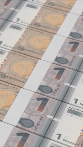video vertical de billetes de 1 manat azerbaiyano impresos por una imprenta de dinero
