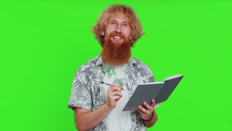 man making notes writing down thoughts with pen into notepad notebook diary, to do list, good idea