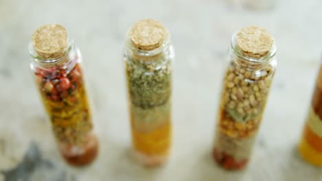 bottles of various spices 4k