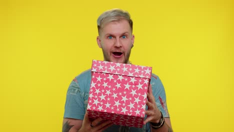 man opening a gift box