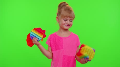 Children-girl-kid-holding-squeezing-anti-stress-touch-screen-push-pop-it-popular-toy-on-chroma-key