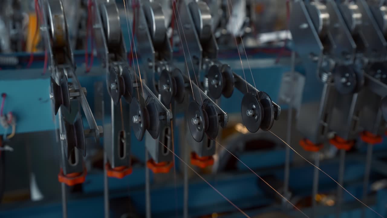 Close-up of wire production machinery