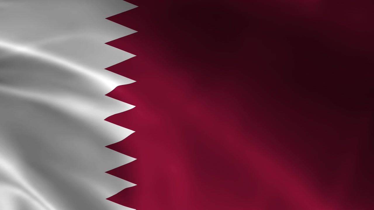 Bandiera nazionale del Qatar che sventola al vento