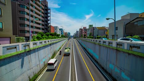 a timelapse of the traffic jam at the urban street in tokyo wide shot