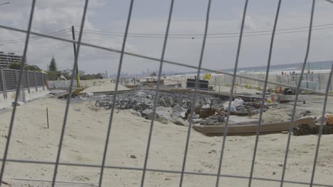 workers engaged in beach construction activities