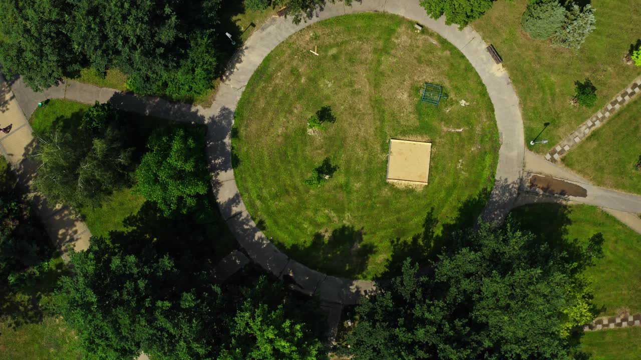 Aerial top drone shot over park and kids playground in ostrava city
