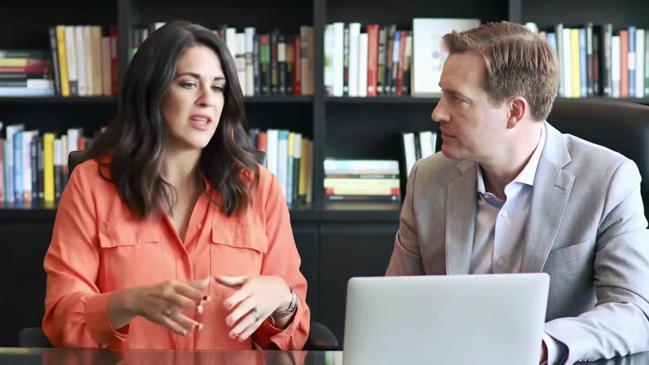 Two Professionals Having a Business Consultation in an Office