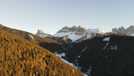 beautiful aerial drone video of the massive dolomite mountains in the italian alps filmed in 4k in winter - fall