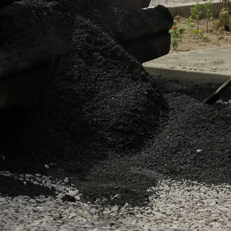 pavimentadores con orugas que colocan asfalto