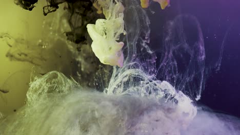 slow motion shot of falling paint ink underwater,magical effect and illusion