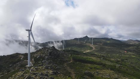 eolic turbines in absence of wind on cloudy day at caramulo in portugal