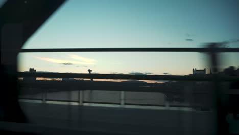 Passenger POV from a tram driving over a Danube bridge in Bratislava.