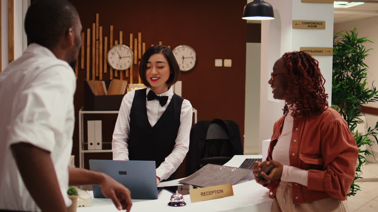 Receptionist presenting holiday package