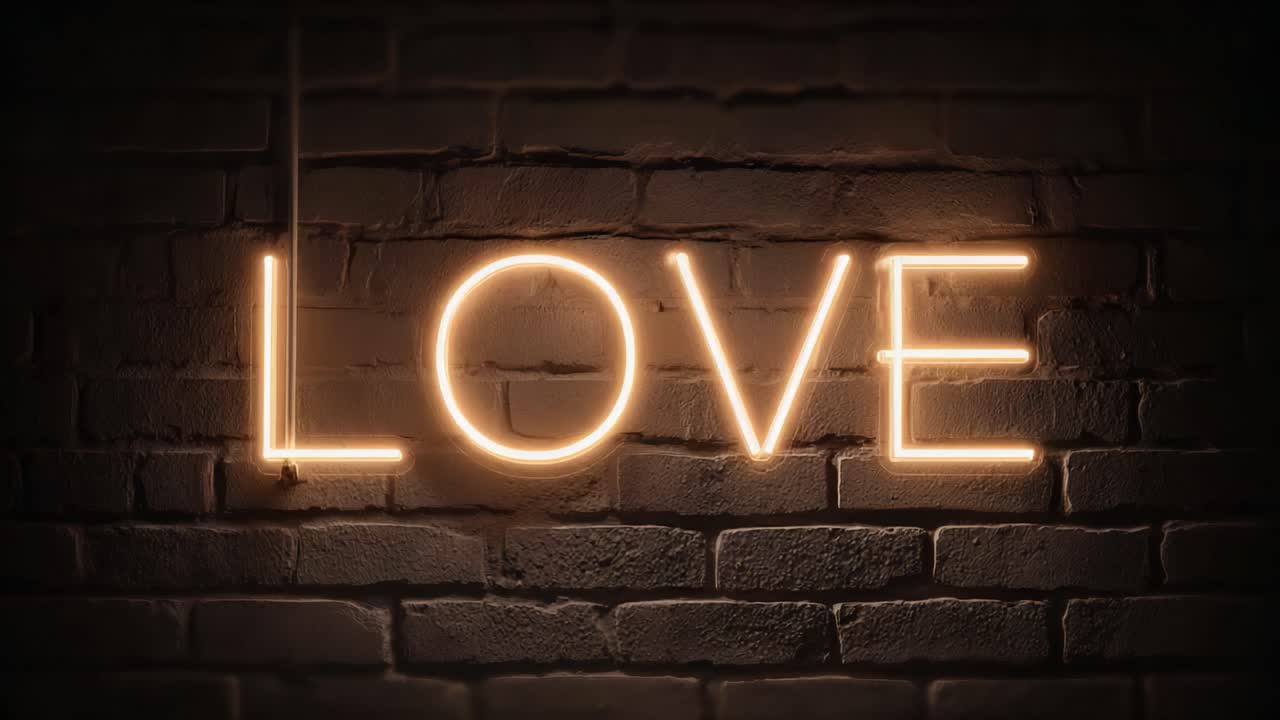 Illuminated Neon Sign Displaying the Word 'LOVE' on a Textured Brick Wall, Creating a Warm and Inviting Atmosphere Perfect for Romantic Settings
