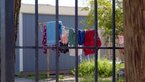 clothes hanging in the sun in el paso's downtown neighborhood in the early hours