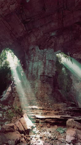 sunlight streaming through a cave opening