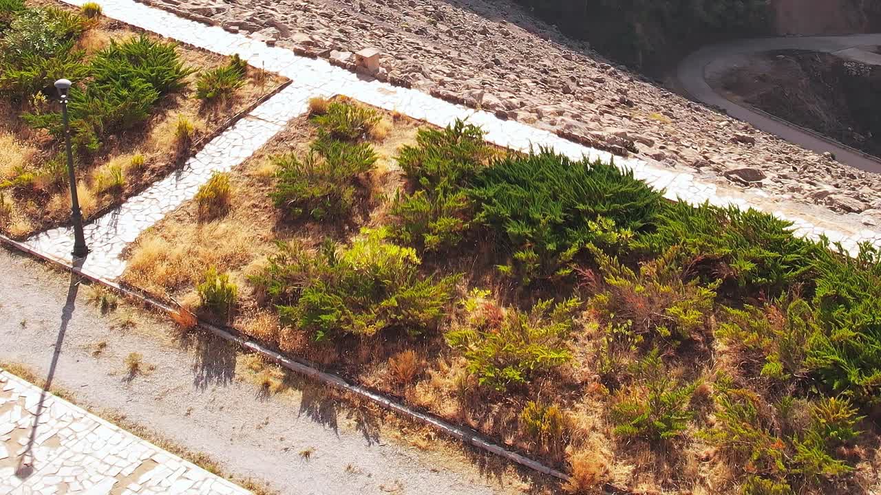Exploring the landscape of Granada Spain with greenery and rocky terrain