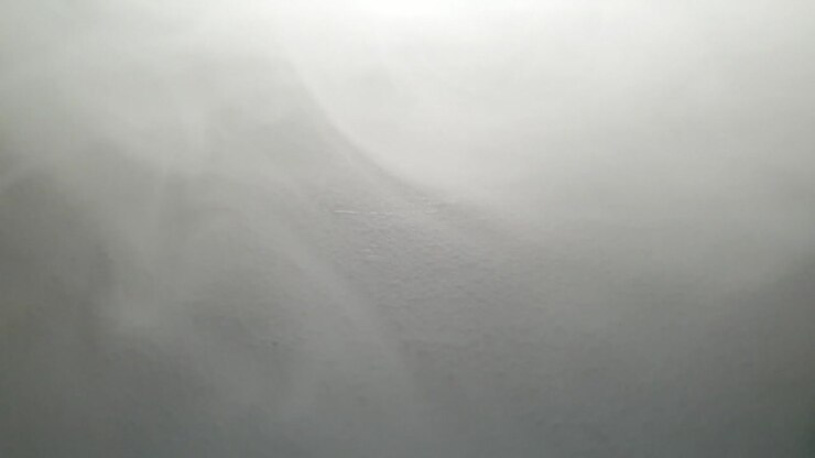 Slow motion fog and smoke moving across textured surface, perfect for eerie, scary and mysterious atmosphere presentations