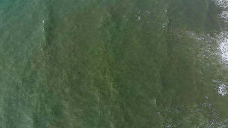 zenithal drone flight sea to shore