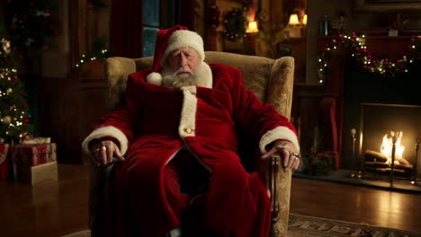 el somnoliento papá noel en su sillón