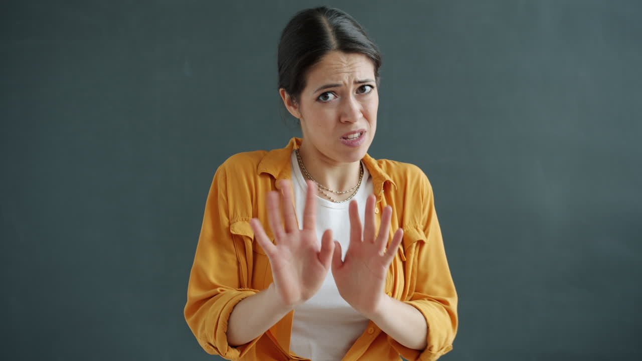 Woman expressing disgust and rejection