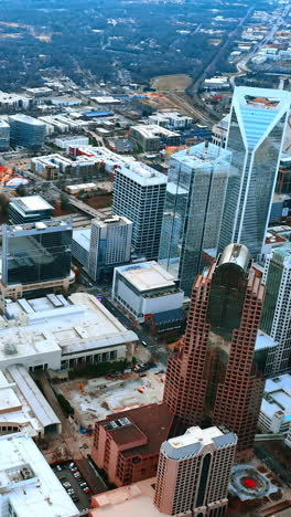 dense urban landscape of the modern american city. drone footage above charlotte, north carolina, usa. vertical video