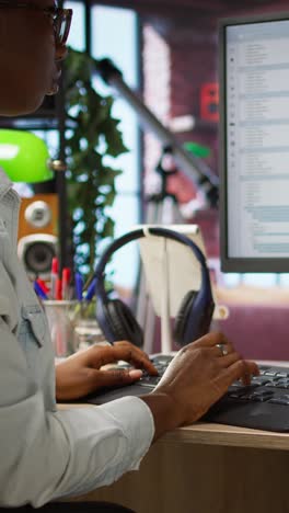 vertical video woman in home office having deadline, stressed to finish coding