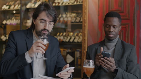 businessmen meeting in a wine bar
