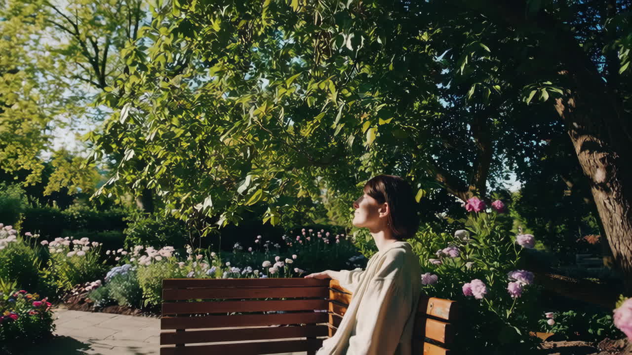 Woman Relaxing in a Park Garden