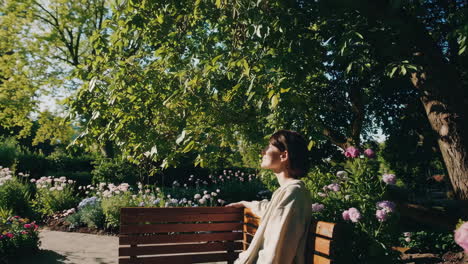 woman relaxing in a park garden