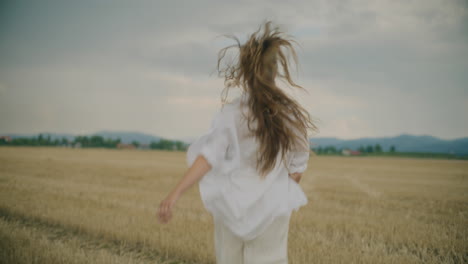 female farmer walking on farm