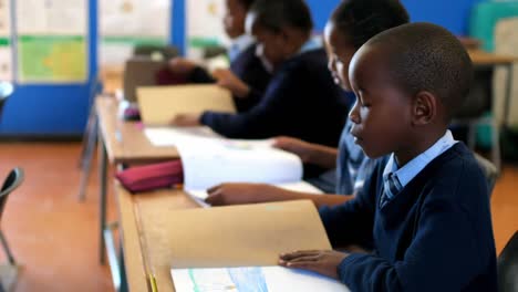 schoolkids studying in the classroom 4k