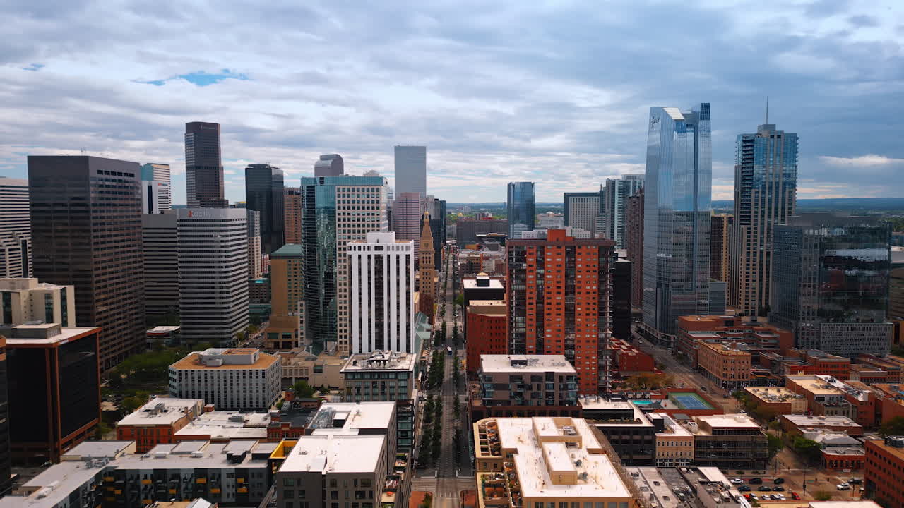 Denver, USA, 28 July 2025: Neighborhood of modern Denver, Colorado, USA. Drone footage over the multi-storied buildings and streets full of cars