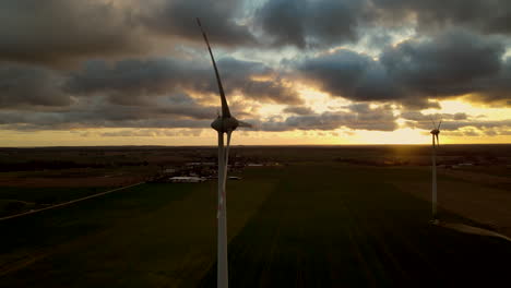 Beautiful-Sunset-View-Of-Windmills-In-The-Dark---Aerial-shot