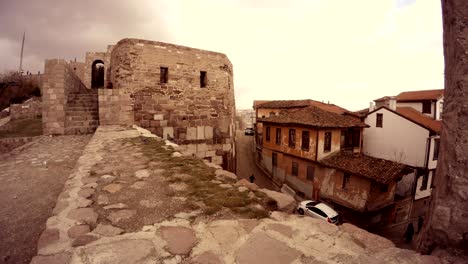 citadel hisar view on city boy runs on street cloudy day ankara