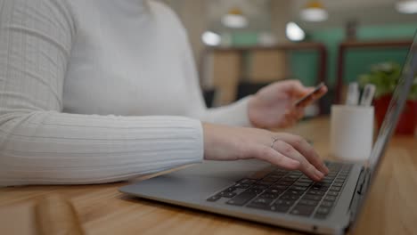 woman online shopping using credit card