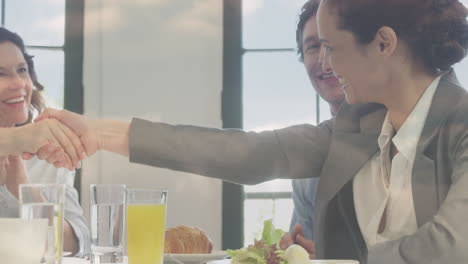 animation of happy caucasian businesswoman and businessman shaking hands