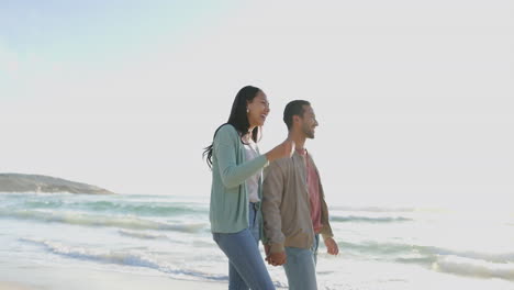 Talking,-holding-hands-and-happy-couple-walk