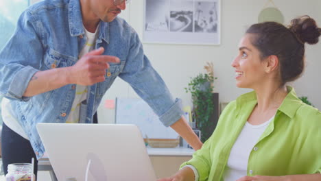 Couple-Running-Online-Business-Making-Candles-At-Home-Celebrating-Order-With-High-Five-And-Hug