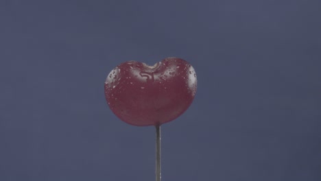 cereza girando con bucle en pantalla azul para la llave de croma