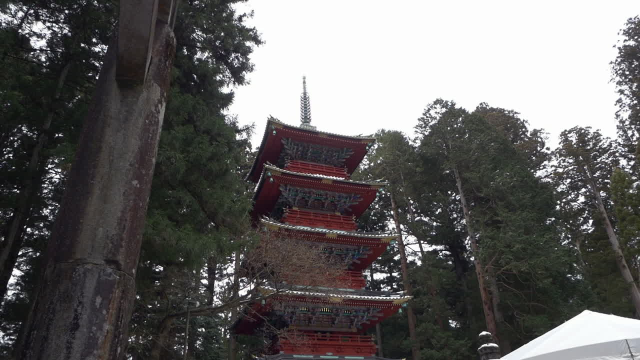 Slowly Passing beneath the Ishidorii stone gate Toshogu Gojunoto, Nikko, Tochigi, Japan.