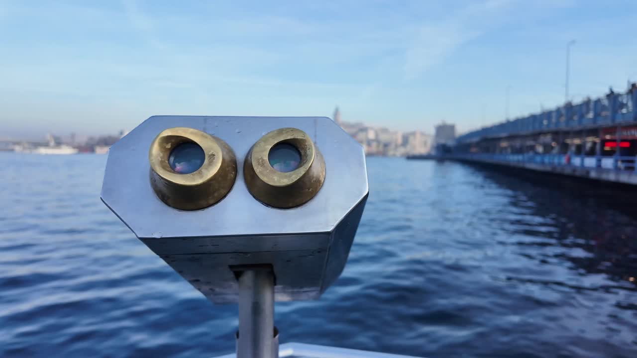Binoculars overlooking the city and sea