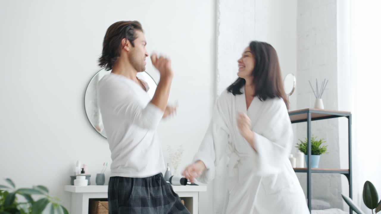 Couple Dancing in a Bathroom