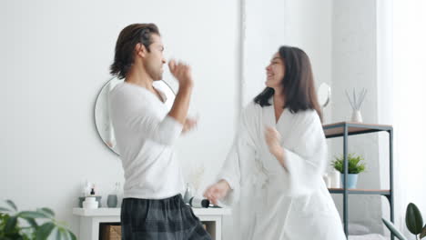 couple dancing in a bathroom